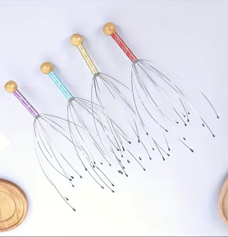 اداة مساج فروة الرأس